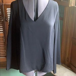 Black v neck blouse.